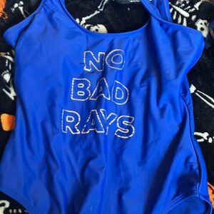 Blue one piece swimsuit, high hip, never worn